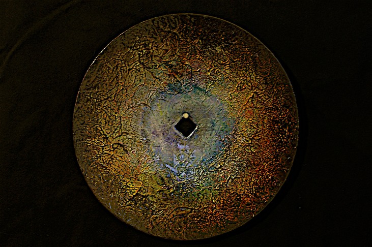 Drew Wood, Insomnia 3, 2006, color-shifting enamel, acrylic, pumice, and synthetic resin on a found concave iron plow disc from a Missouri farm, radius 8", Lydia Hao Collection