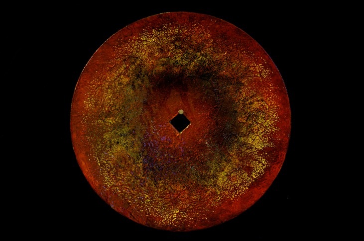 Drew Wood, Insomnia 9, 2007, color-shifting enamel, acrylic, and synthetic resin on found concave iron disc from a plow from Missouri farm, radius 8", nfs